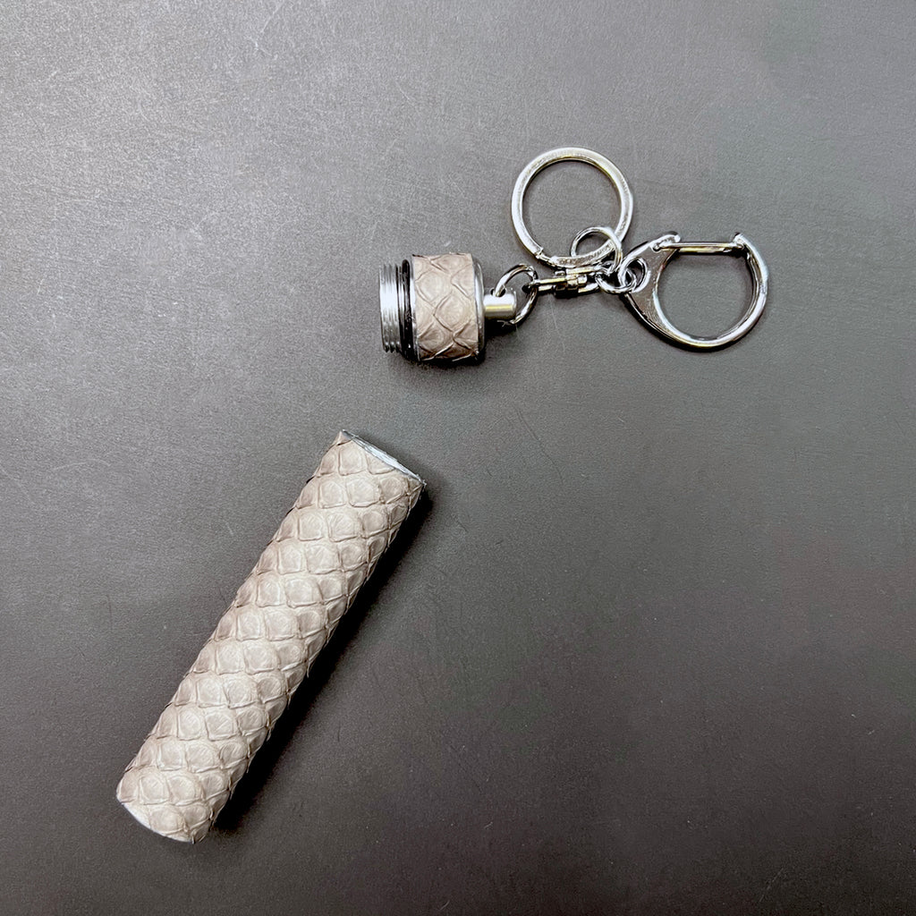 Open Storm Grey python wrapped joint holder keychain displaying detachable cap and compact design