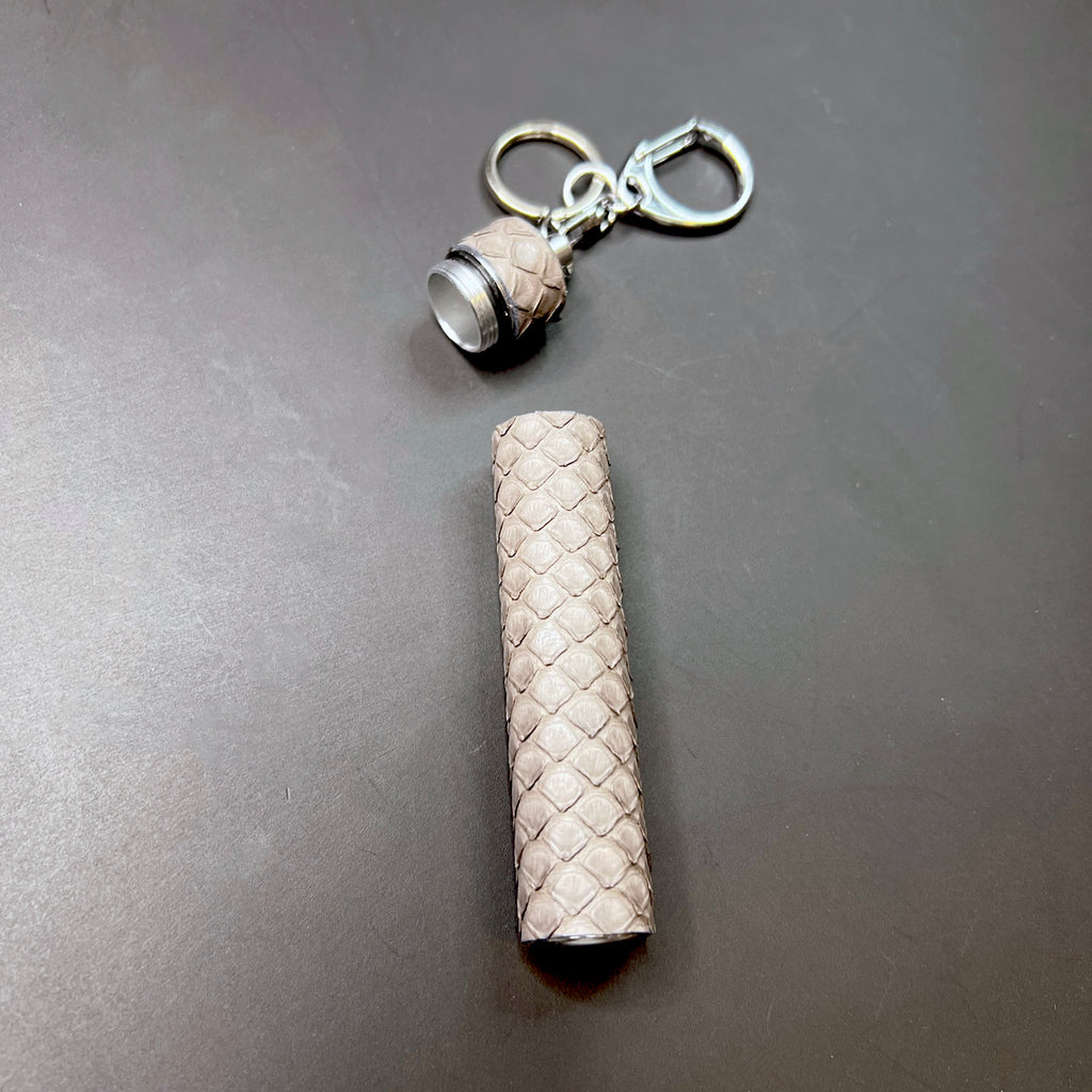 Open Storm Grey python wrapped joint holder keychain displaying detachable cap and compact design