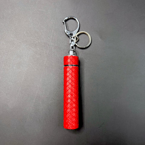 Luxury Candy Red python wrapped J carrier with keychain clip on black background