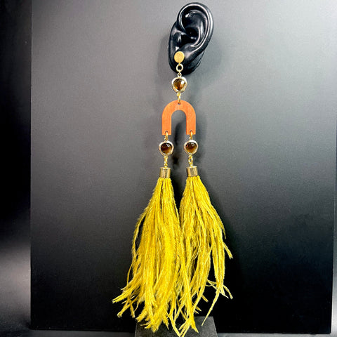 Yellow feather statement earrings with amber gemstones, terracotta acrylic arch, and gold accents