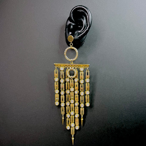 Lepuma chandelier earrings with clear crystal drops and gold-tone hardware – statement cocktail jewelry