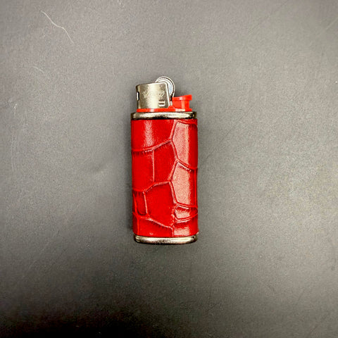 Red croc-embossed calfskin Haus of Topper Mini lighter case featuring an Belly crocodile pattern, silver-tone trim and Bic Mini lighter.