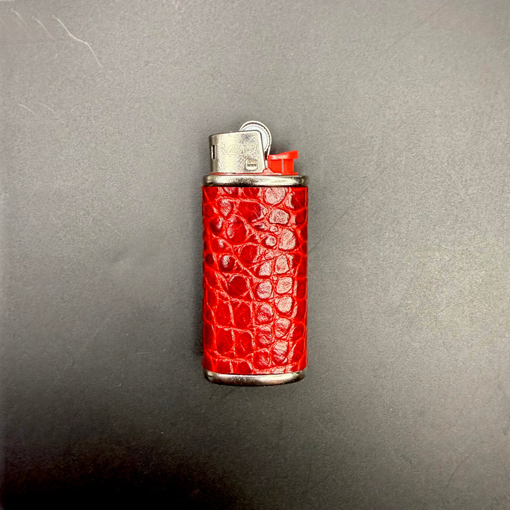 Haus of Topper red croc-embossed calfskin  in Flank skin pattern Mini lighter case with glossy finish and silver-tone metal trim, fitted with a Bic Mini lighter.