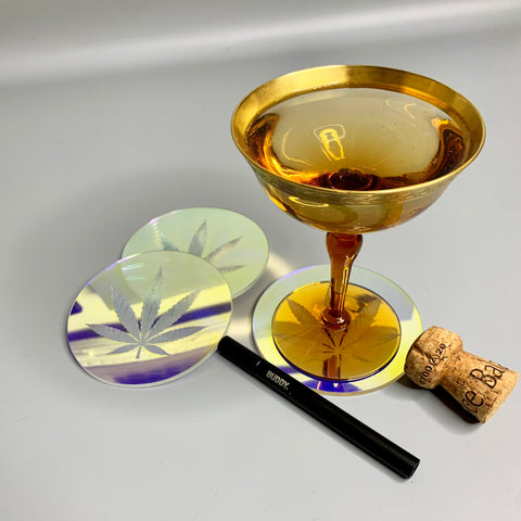 Iridescent acrylic cocktail coaster engraved with cannabis leaf