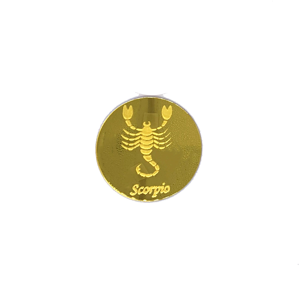 Round, gold mirrored acrylic drink coasters engraved with the scorpion astrology symbol