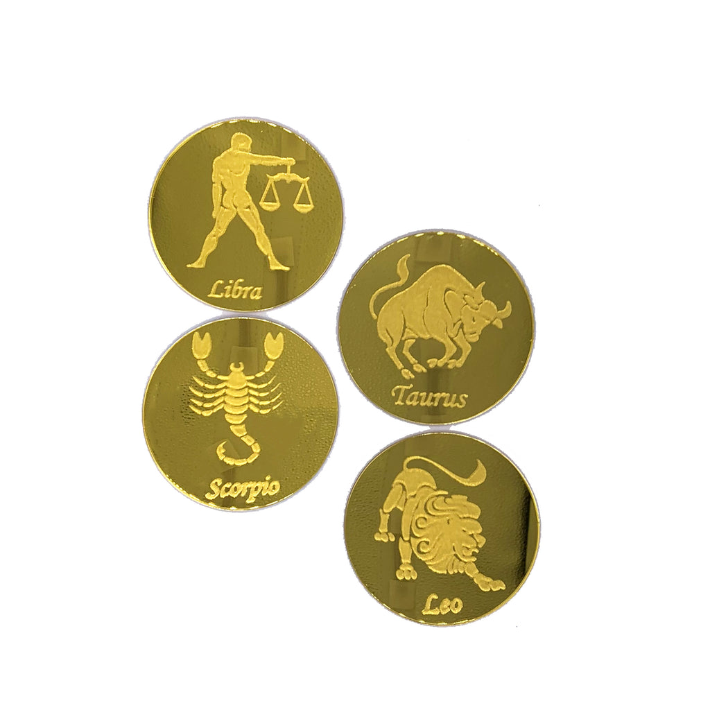 Round, gold mirrored acrylic drink coasters engraved with the zodiac signs